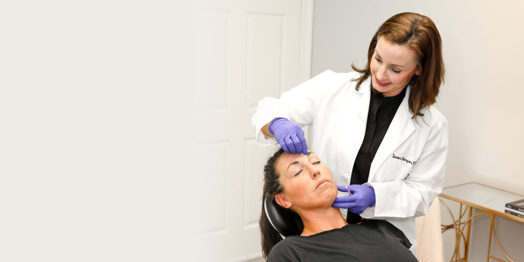 doctor with patient about to start facial procedure